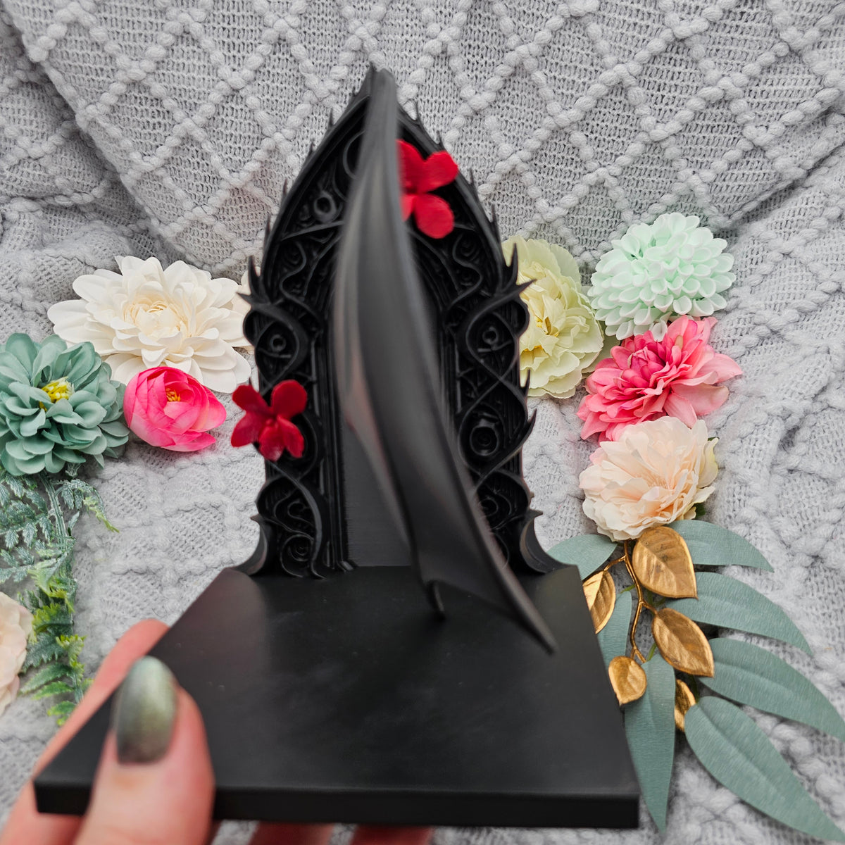 Buchstützen Flügel und Blüten Set Schwarz | Buchhalter