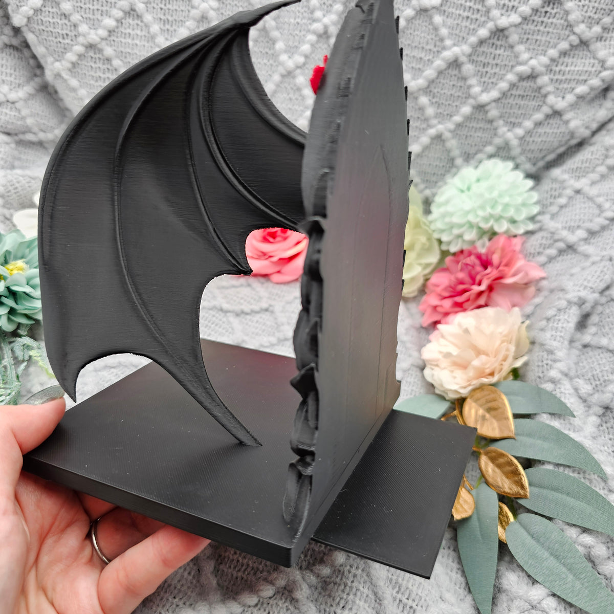 Buchstützen Flügel und Blüten Set Schwarz | Buchhalter